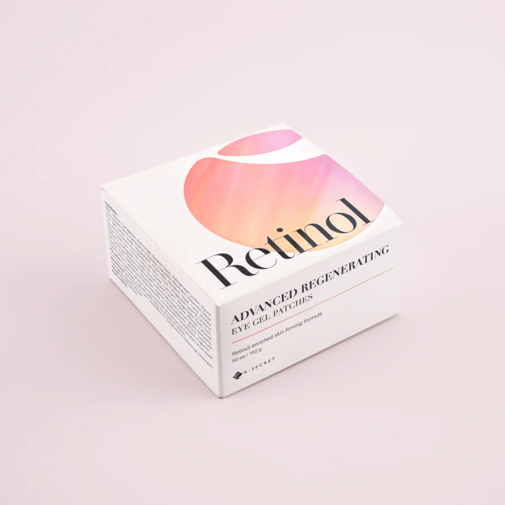 Förpackning av K-Secret Advanced Regenerating Eye Gel Patches med retinol i vit och rosa design.