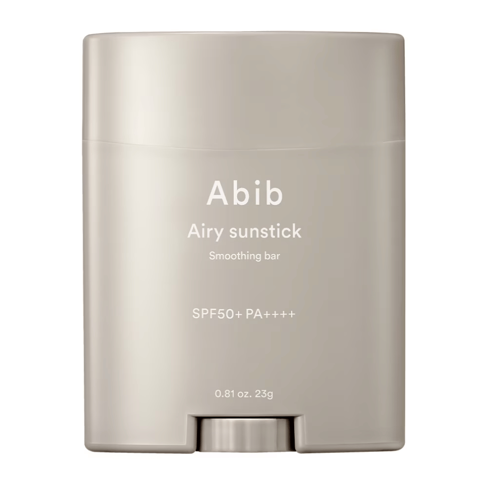 The image shows a beige sun protection stick from Abib with the text "Airy Sunstick Smoothing Bar" and sun protection factor SPF50+ PA++++, perfect for daily protection against UV rays.