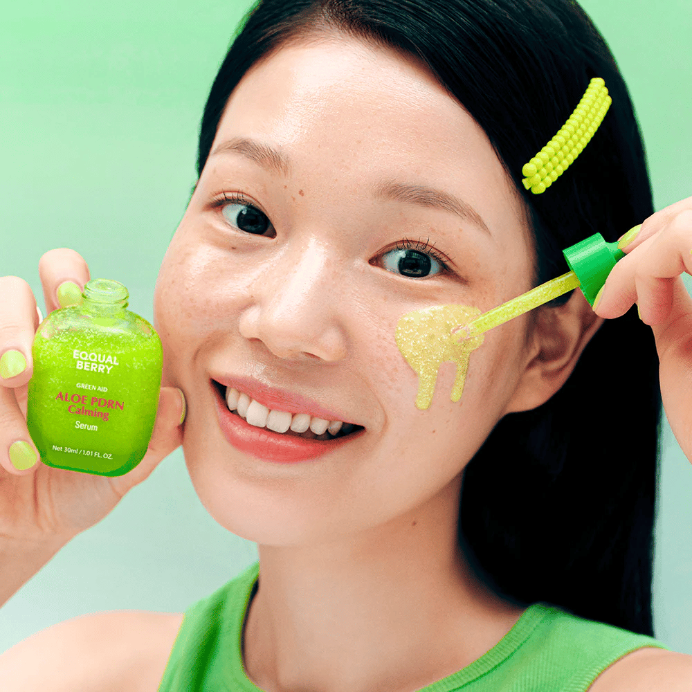 Model applies EQQUALBERRY Aloe PDRN Calming Serum with a pipette – light gel serum that soothes redness and gives a natural glow.