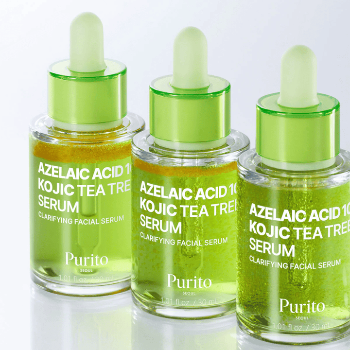 Tre flaskor av Purito Azelaic Acid 10 Kojic Tea Tree Serum. Formulan balanserar talg, minskar porer och ger jämnare hudton.