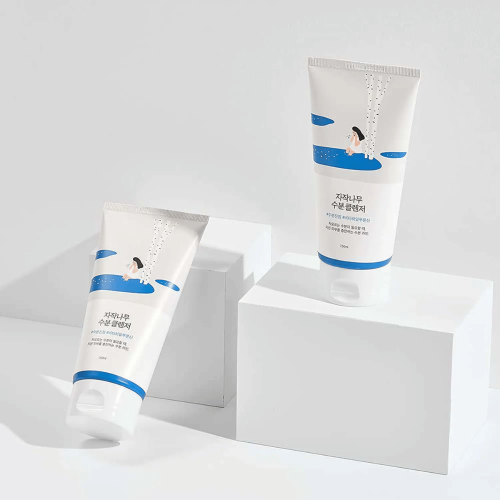 ROUND LAB Birch Juice Moisturizing Cleanser in two tubes on a white background, mild and moisturizing facial cleanser with birch sap that gently cleanses and suits all skin types, even sensitive skin.