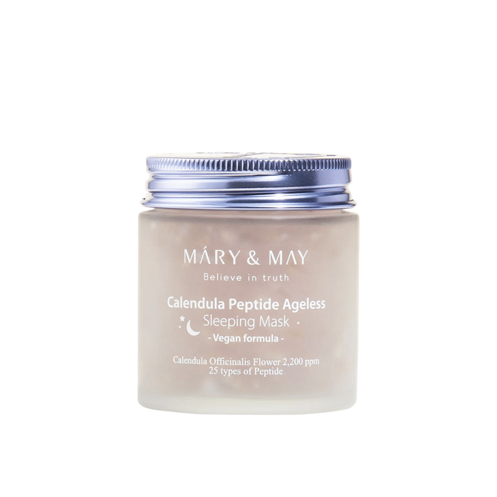 A jar of MARY & MAY Calendula Peptide Ageless Sleeping Mask. The jar has a silver-colored lid and a label with the text "Calendula Peptide Ageless Sleeping Mask" and "Vegan formula". The product contains calendula and peptides to give the skin a youthful appearance overnight.