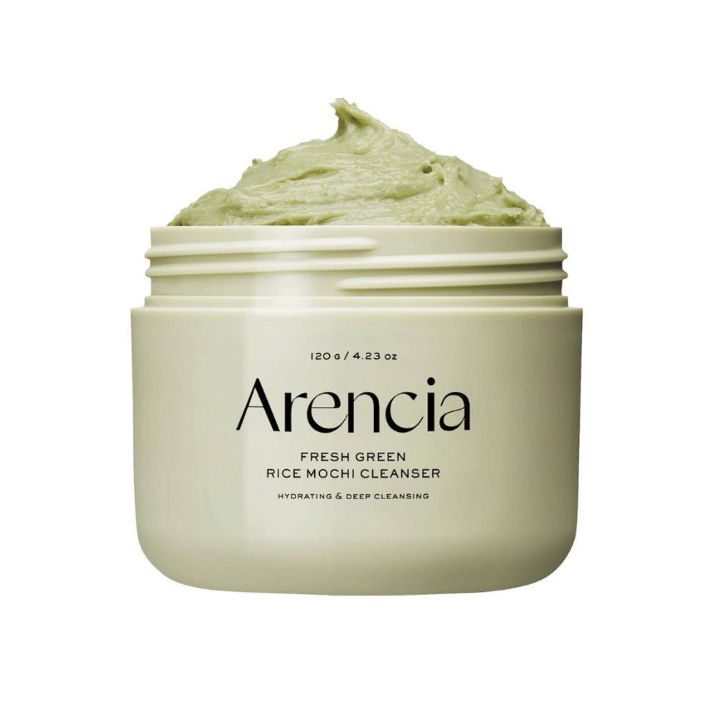Open jar with Arencia Fresh Green Rice Mochi Cleanser 120g, a green creamy cleanser with the text "Hydrating & Deep Cleansing" on the packaging.