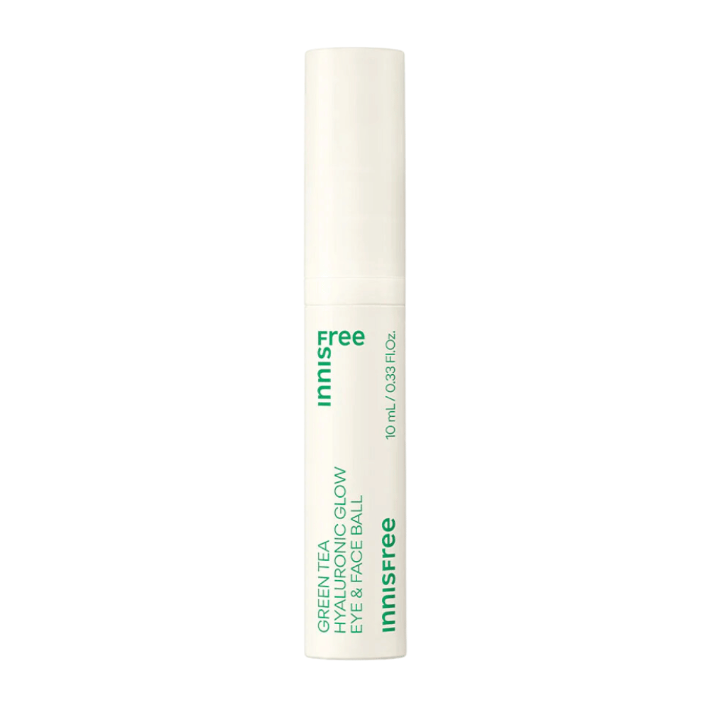 Innisfree Green Tea Hyaluronic Glow Eye & Face Ball is presented in a white bottle with green text. The product has a round applicator and contains 10 ml. The design is simple and elegant, with a focus on the product in the foreground.
