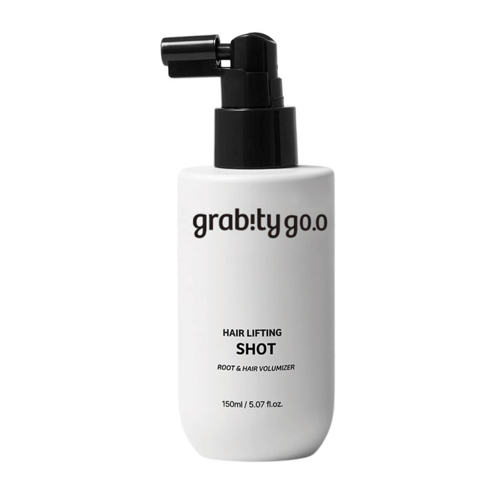 Grabity Hair Lifting Shot Root & Hair Volumizer in a stylish white spray bottle. A volumizing hair product developed to lift the hair roots, give fuller hair, and facilitate styling.