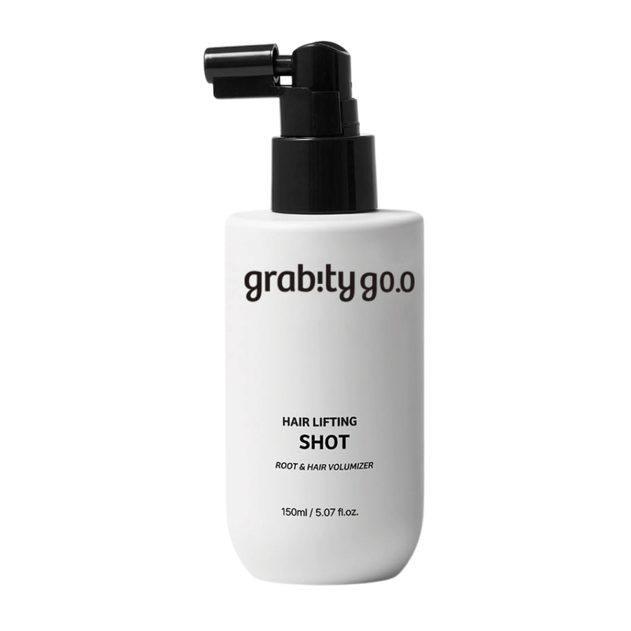 Grabity Hair Lifting Shot Root & Hair Volumizer in a stylish white spray bottle. A volumizing hair product developed to lift the hair roots, give fuller hair, and facilitate styling.
