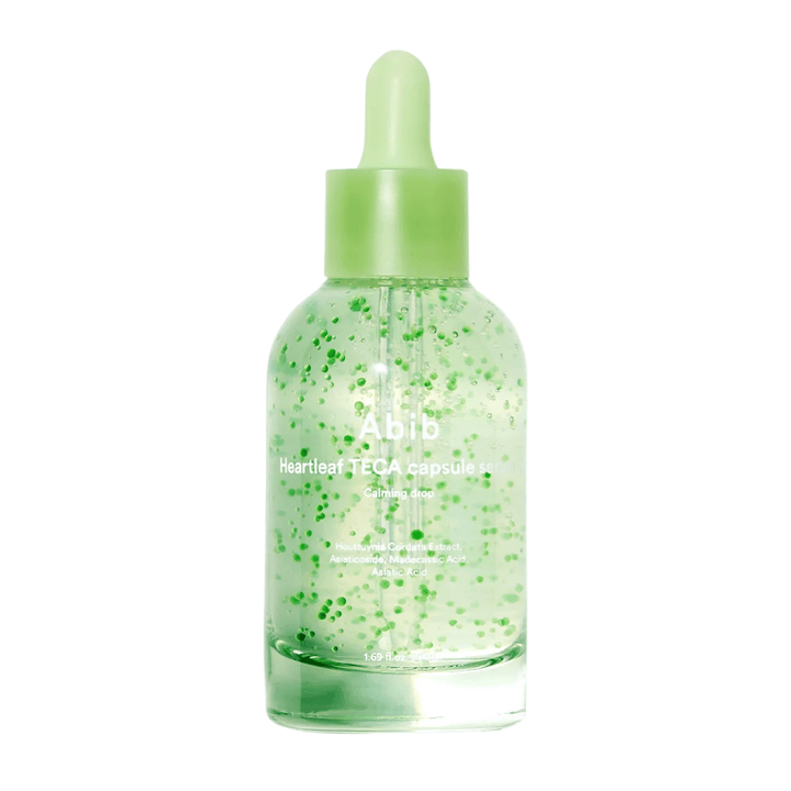 Clean product image of Abib Heartleaf TECA Capsule Serum with green capsules visible in the bottle and focus on the soothing serum design.