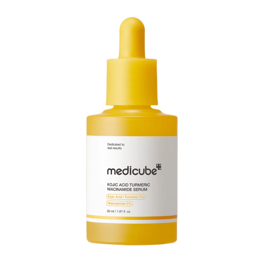Cut-out product image of Medicube Kojic Acid Turmeric Niacinamide Serum with a yellow bottle and dropper. The minimalist design and warm colors create a modern and clinical impression while associating the product with glow and brightening skincare.