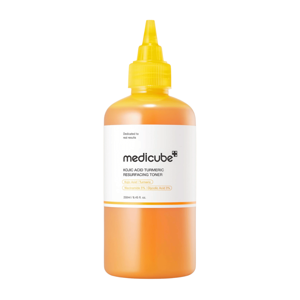 Cut-out product image of Medicube Kojic Acid Turmeric Resurfacing Toner in a yellow applicator bottle for exfoliating skincare and improved skin texture.