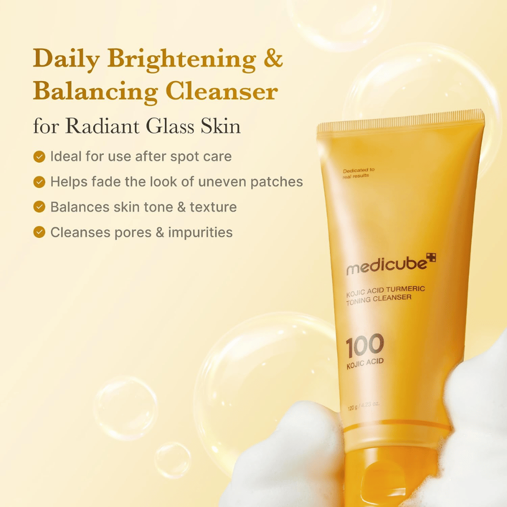 Medicube Kojic Acid Turmeric Toning Cleanser, cleanser for a more even skin tone and radiance. Yellow tube with cleansing foam and product benefits.