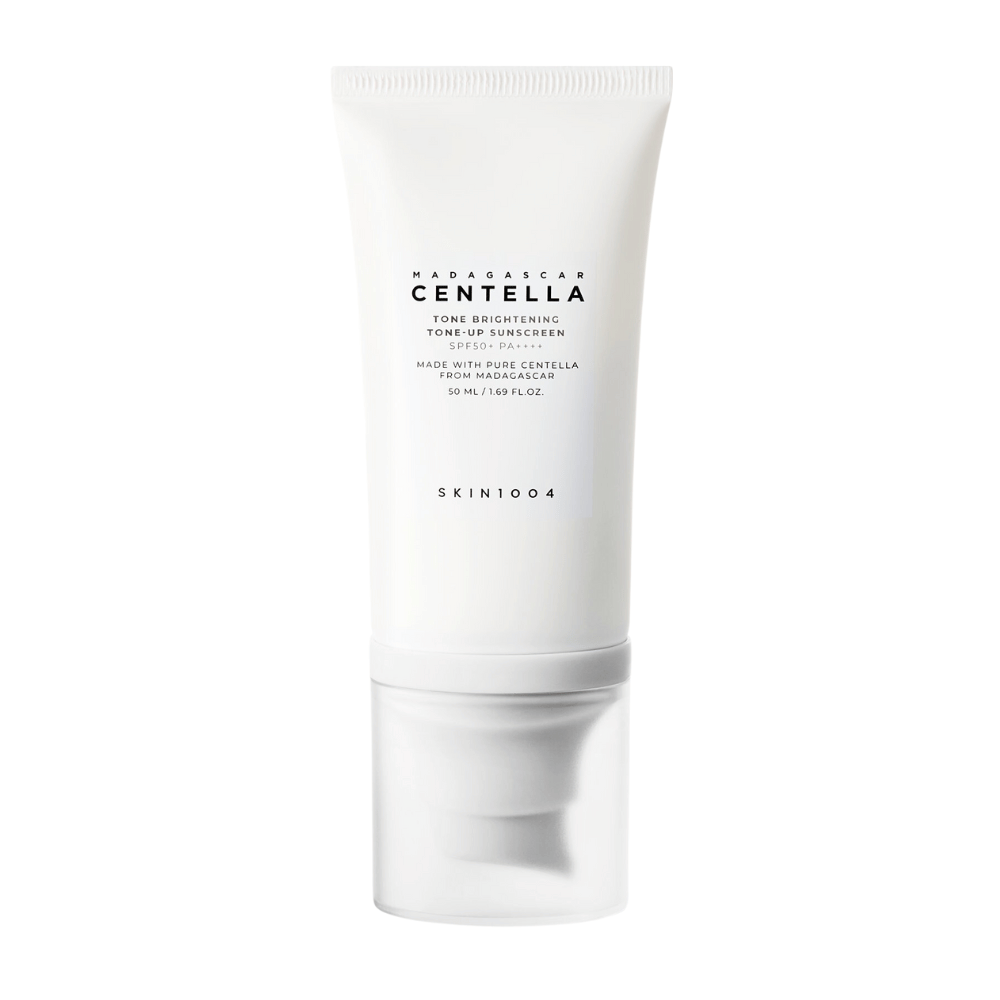 A tube of Madagascar Centella Tone Brightening Tone-Up Sunscreen from SKIN1004. The tube is white with black text and contains 50 ml. The product has SPF 50+ PA++++ and is made with pure Centella from Madagascar.