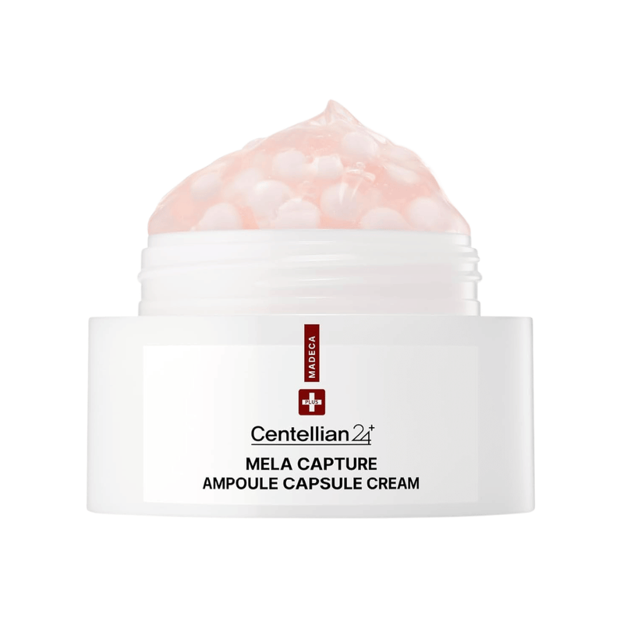 Close-up of Centellian24 Madeca Mela Capture Ampoule Capsule Cream showing the pink gel cream with encapsulated ampoule beads in the jar.