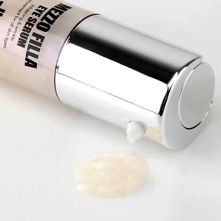 MEDI-PEEL Mezzo Filla Eye Serum in silver packaging with visible serum texture – Korean eye serum that hydrates, plumps, and counters fine lines around the eyes.