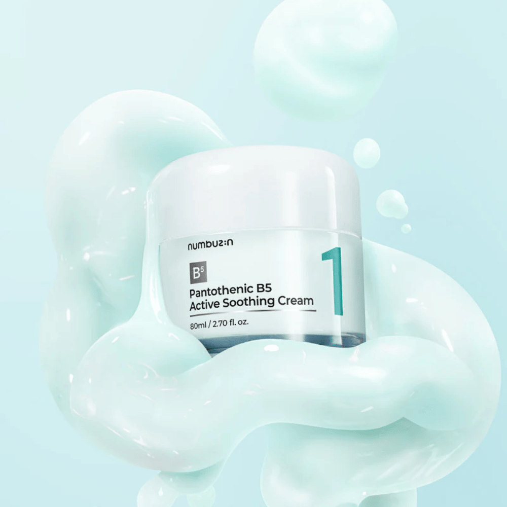 Numbuzin No.1 Pantothenic B5 Active Soothing Cream 80 ml in a light green jar with a white lid, surrounded by soft waves of light green creamy texture against a light blue background.