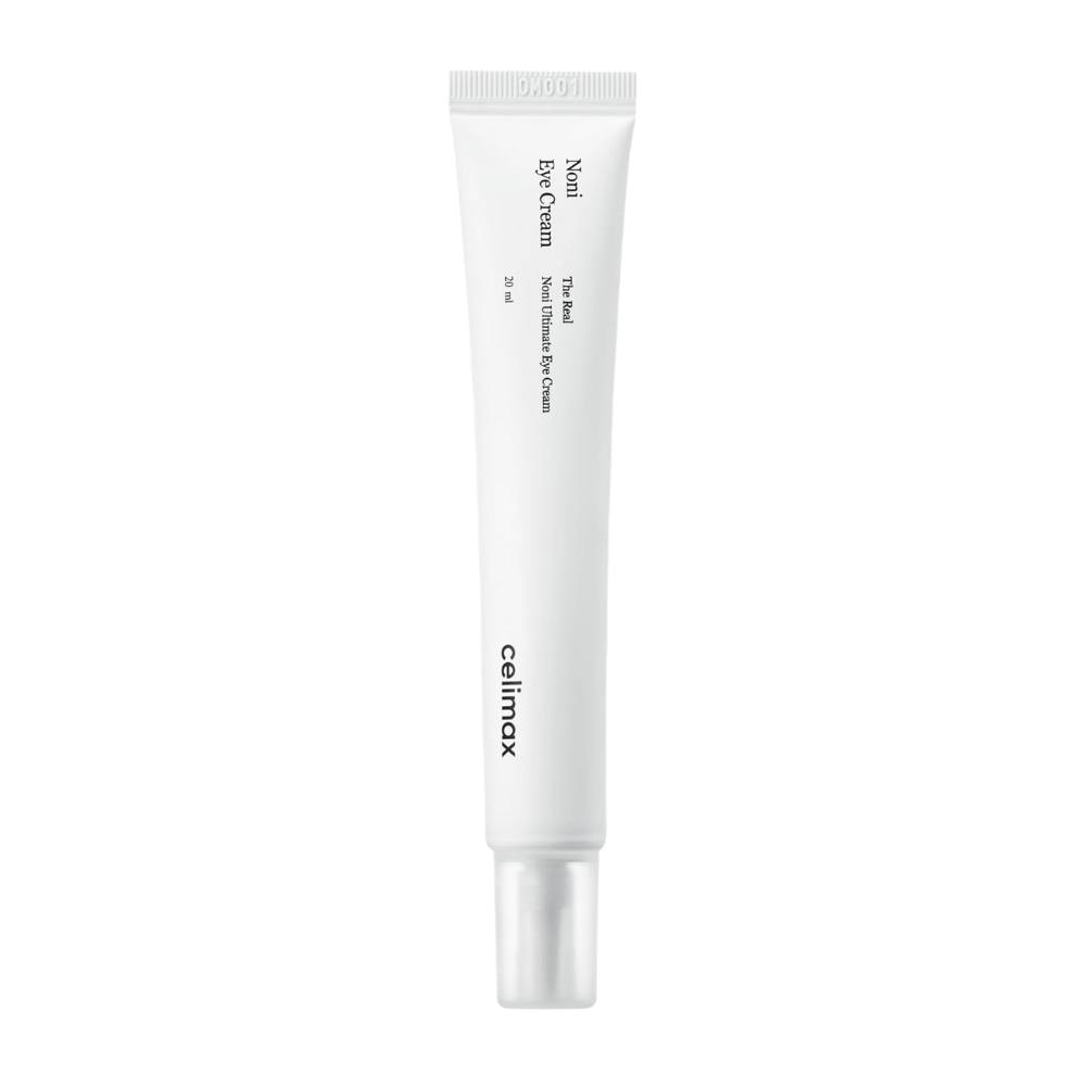 Noni Eye Cream in a white tube with a transparent cap. The product is from the brand Celimax and contains 20 ml. The text on the tube indicates that it is a nourishing eye cream.