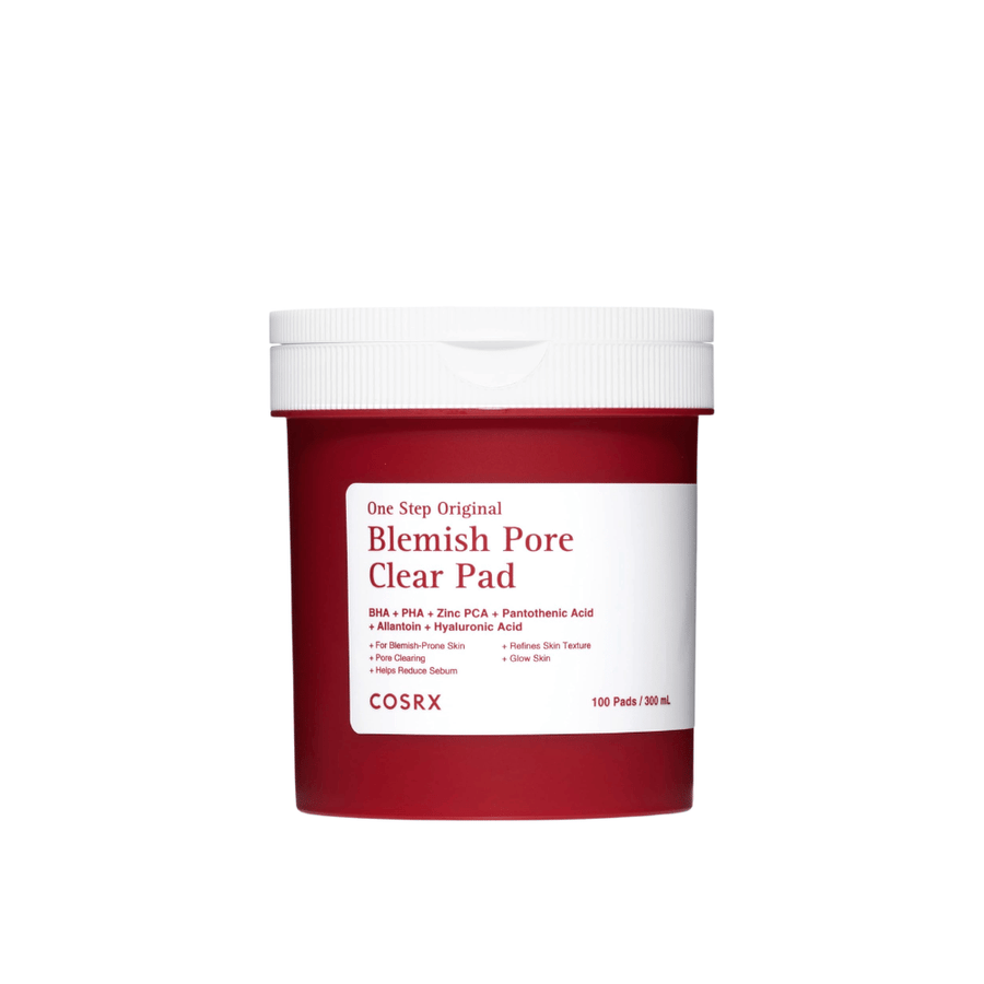 Cut-out product image of COSRX One Step Original Blemish Pore Clear Pad in red and white packaging against a light background.