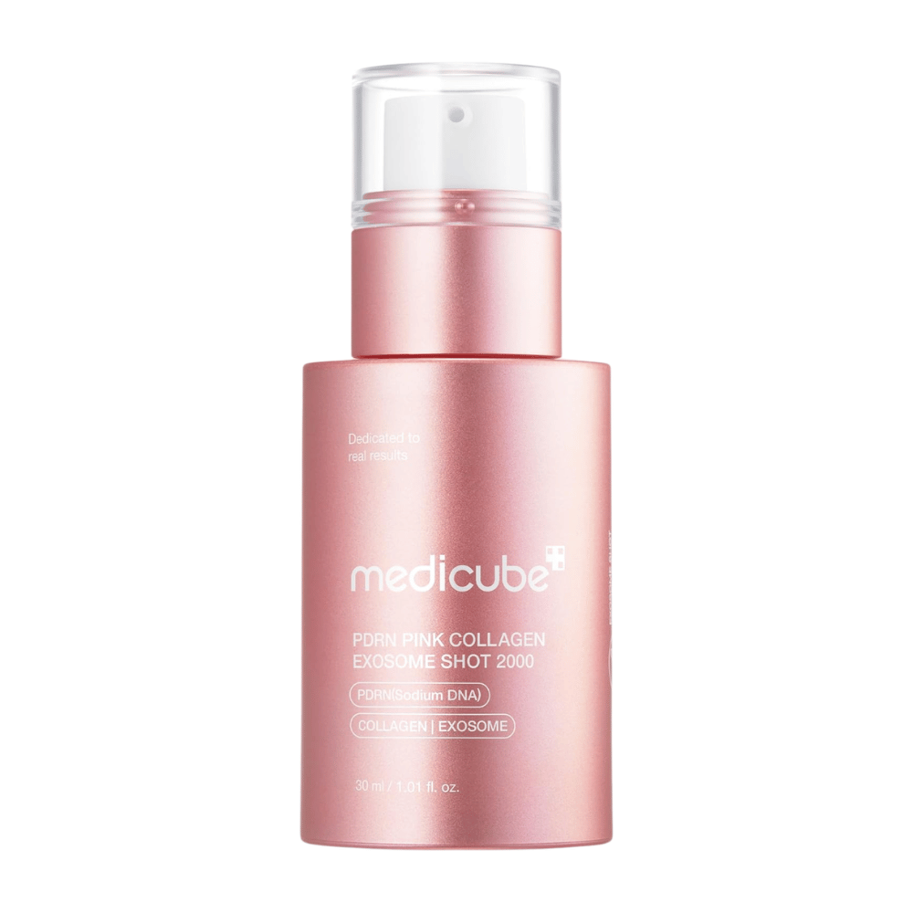 Product image of Medicube PDRN Pink Collagen Exosome Shot 2000 in a pink bottle against a light background. Serum with PDRN, collagen, and exosomes that is developed to provide the skin with hydration and an improved skin feel.