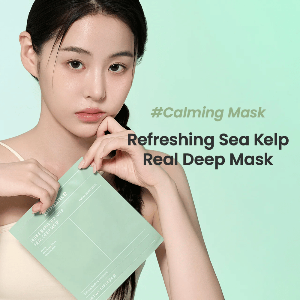 Woman with fresh skin holding a Refreshing Sea Kelp Real Deep Mask. A calming and hydrating face mask with seaweed for a radiant and balanced skin.