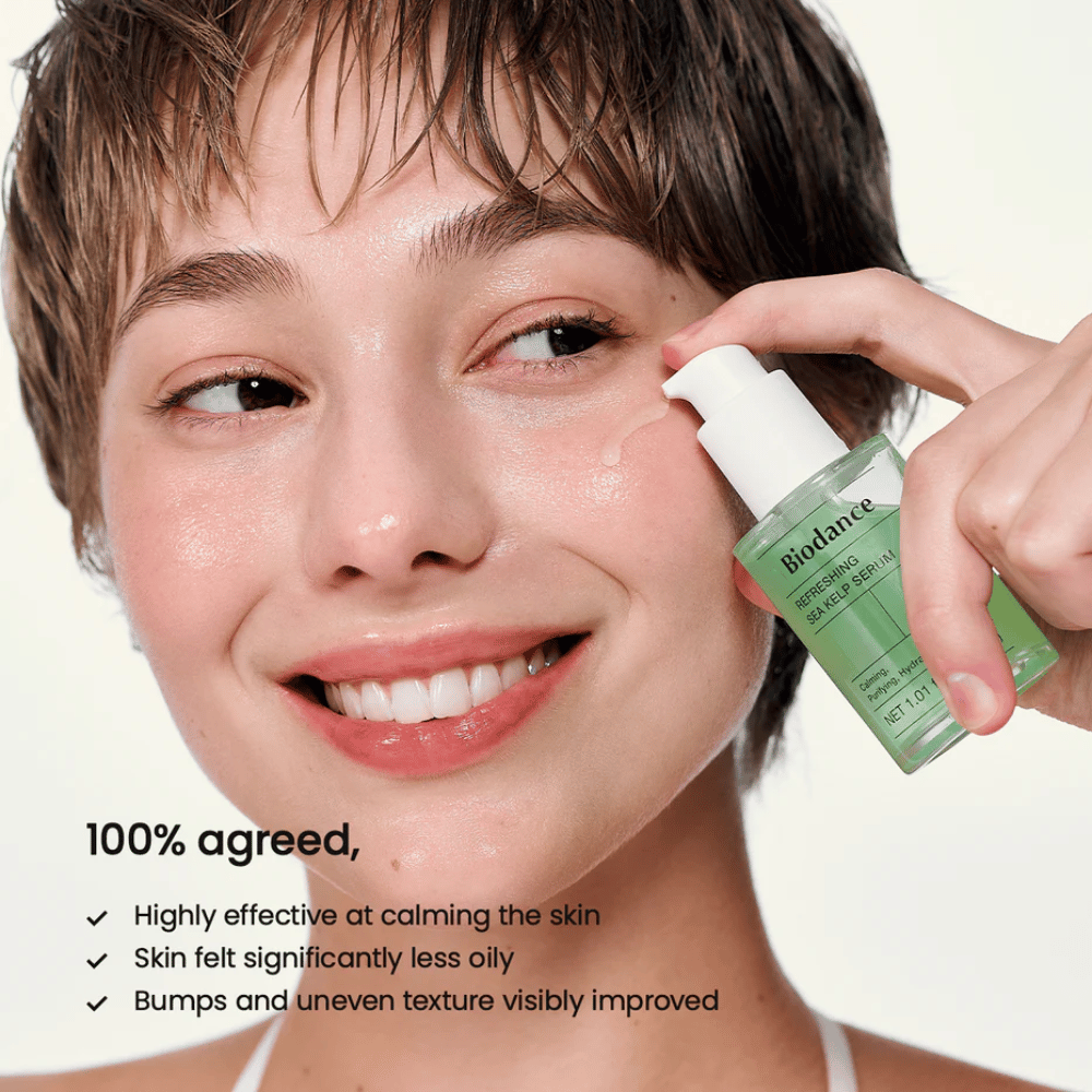 Model applies Biodance Sea Kelp Serum – balances sebum and soothes sensitive skin.