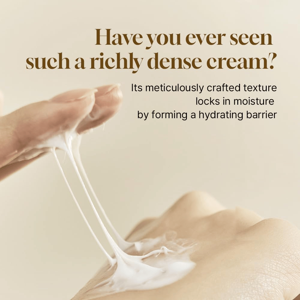 Rich and dense consistency of Salmon Caring Centella Cream showing how the cream forms a moisturizing barrier and locks in moisture in the skin.