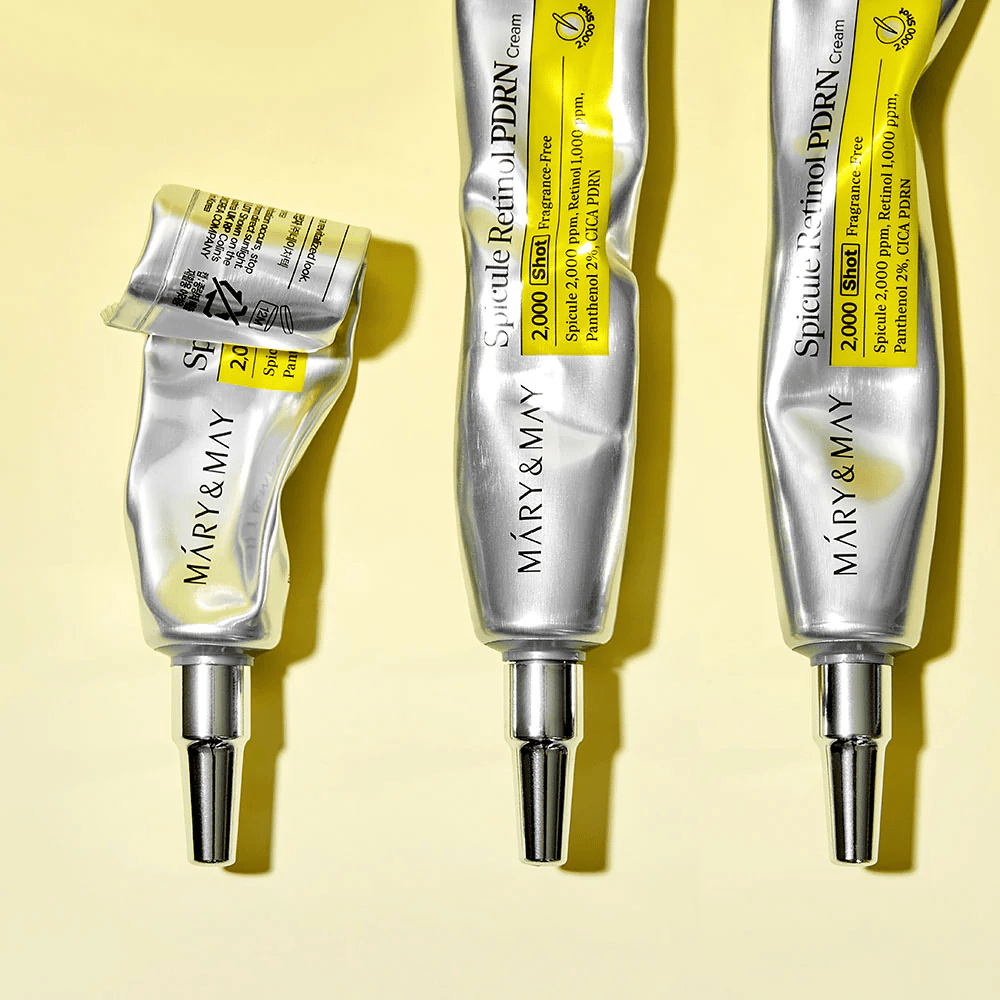 MARY & MAY Spicule Retinol PDRN Cream with visible usage in a tube, showing the cream's consistency and targeted applicator for precise application on the skin.