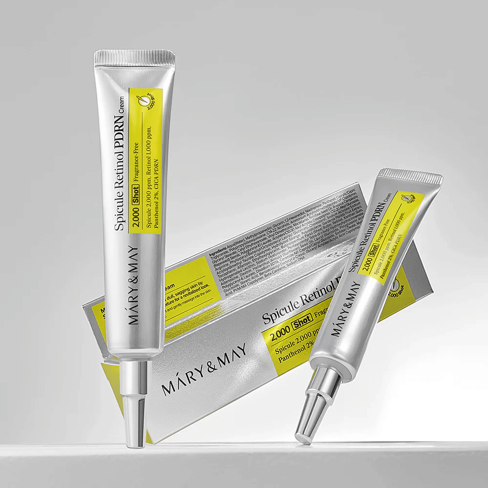 MARY & MAY Spicule Retinol PDRN Cream in a tube together with original packaging, a Korean face cream with retinol and PDRN that supports skin regeneration.