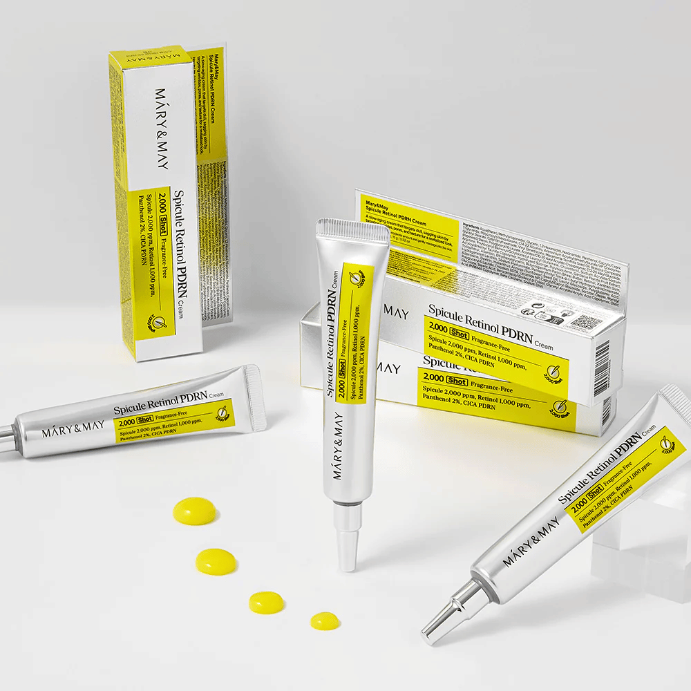 MARY & MAY Spicule Retinol PDRN Cream with multiple tubes and visible cream texture, designed to stimulate cell renewal, improve elasticity, and provide an even skin tone.