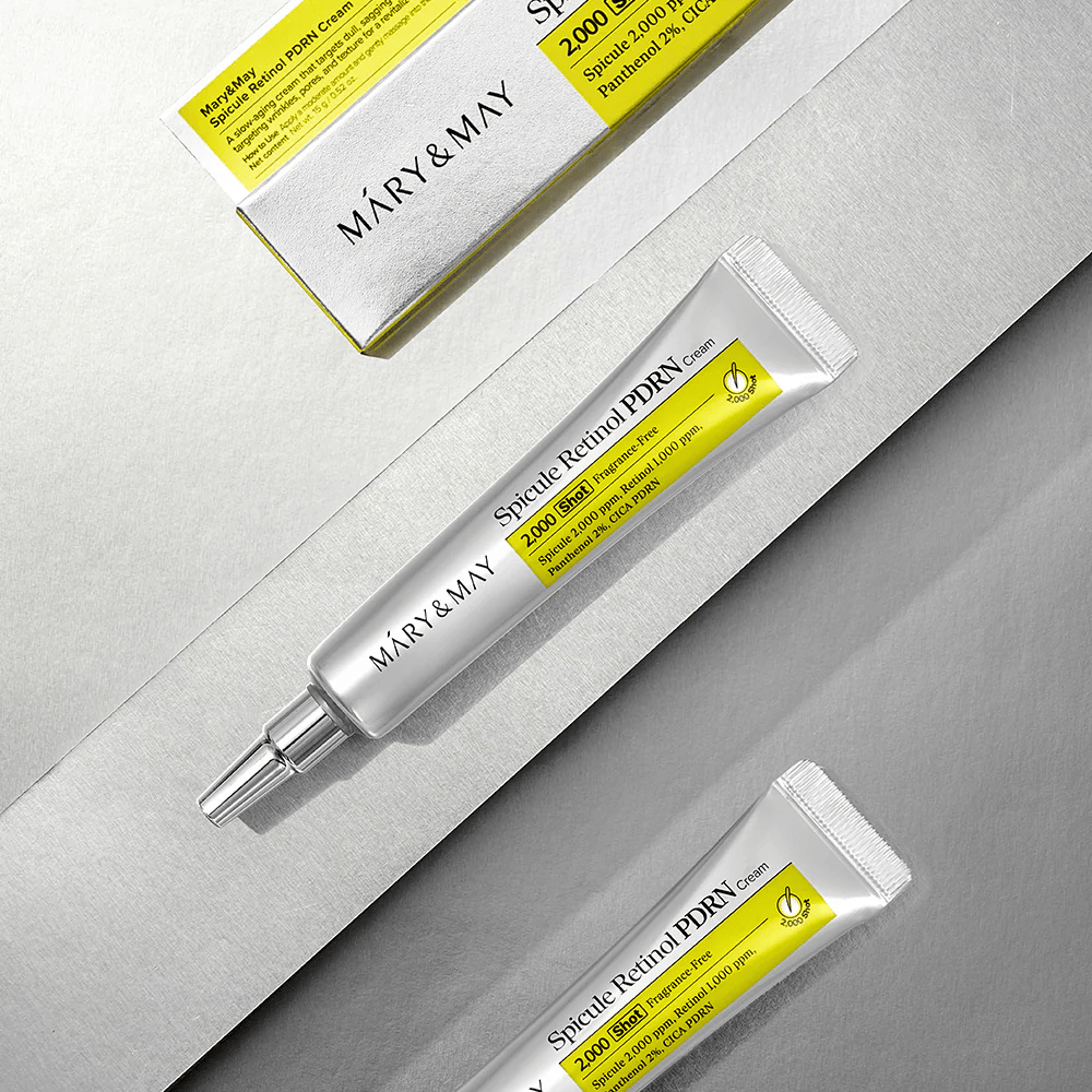 MARY & MAY Spicule Retinol PDRN Cream in a tube and packaging on a light background, an active face cream with retinol, spicule technology, and PDRN for improved skin texture and skin renewal.