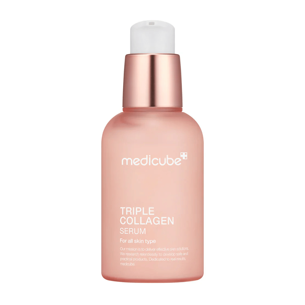 A pink bottle of Medicube Triple Collagen Serum, designed for all skin types. The smooth, frosted glass bottle with a metallic pink cap and white pump gives an elegant look, and the text highlights the serum's triple collagen formula.