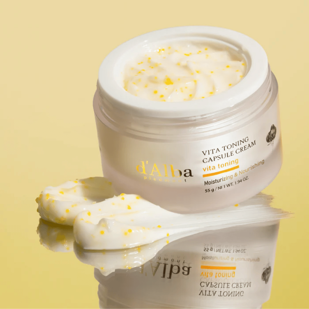 d'Alba Vita Toning Capsule Cream texture – face cream with white capsules that melt into the skin and help to moisturize and provide a clearer skin tone.