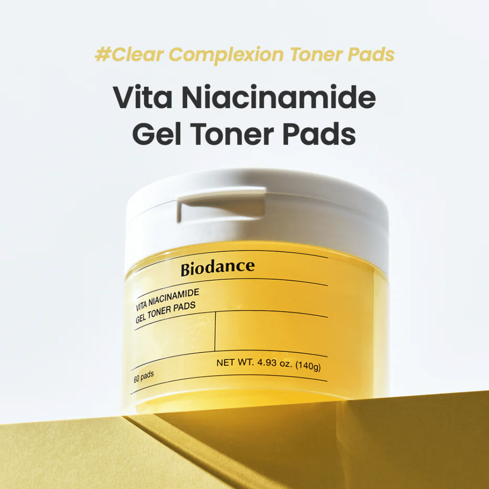 Biodance Vita Niacinamide Gel Toner Pads – jar with 60 pads for clearer skin tone, shown on a yellow podium with a clear label and modern design.