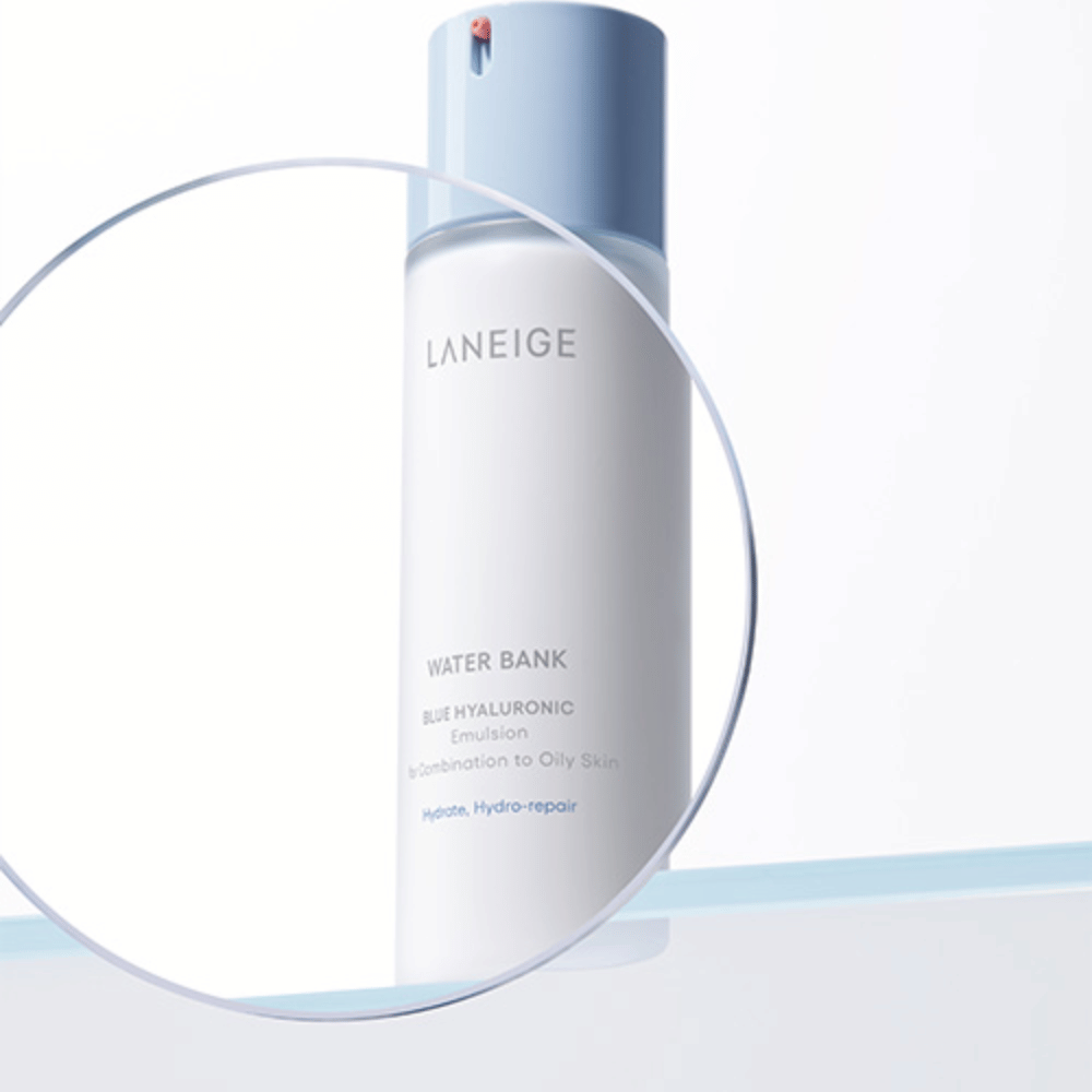 LANEIGE Water Bank Blue Hyaluronic Emulsion with light blue pump, seen through a magnifying glass against white background with blue edge.