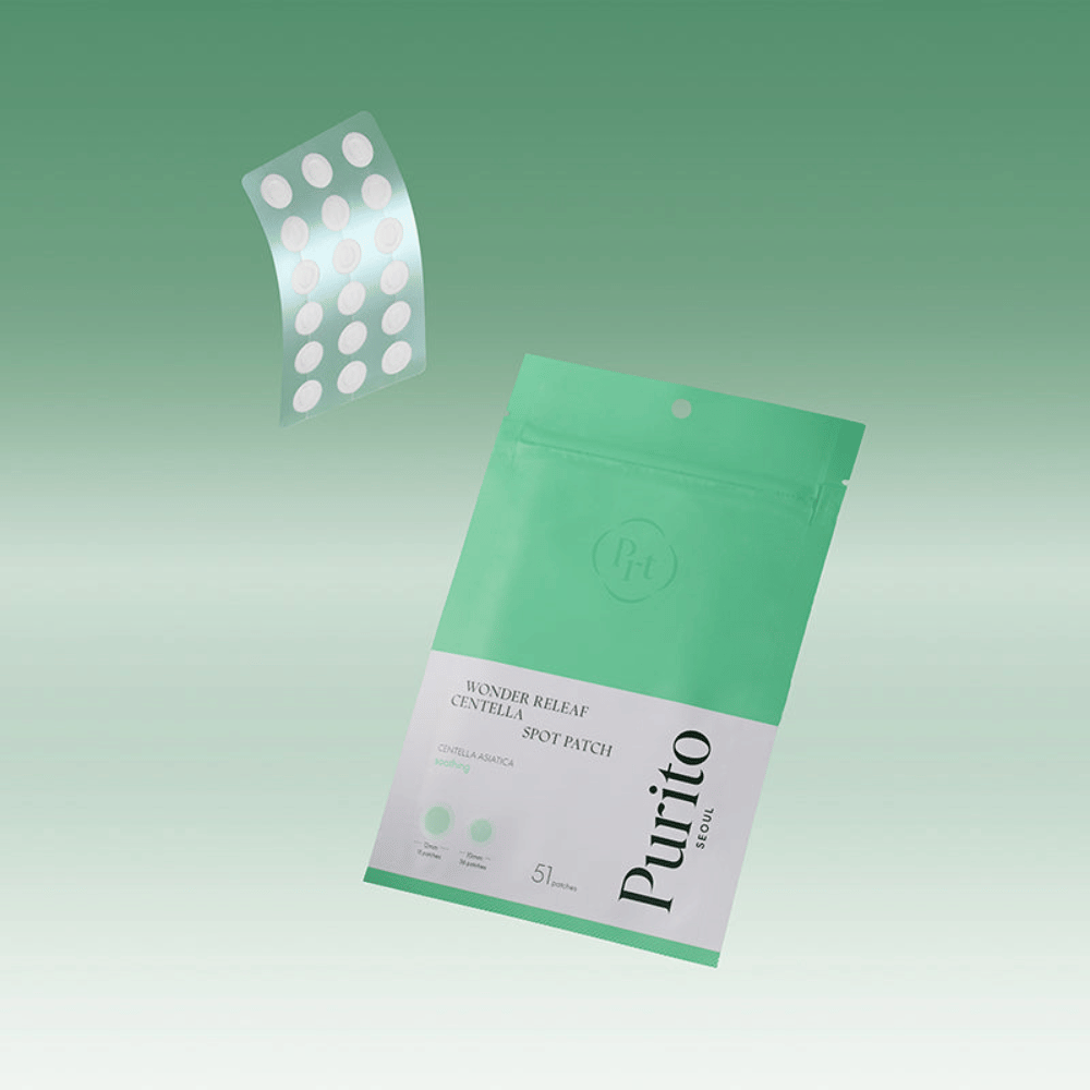 Purito Wonder Releaf Centella Spot Patch with packaging and transparent acne patches, soothing spot treatment with centella asiatica for pimples and irritated skin.