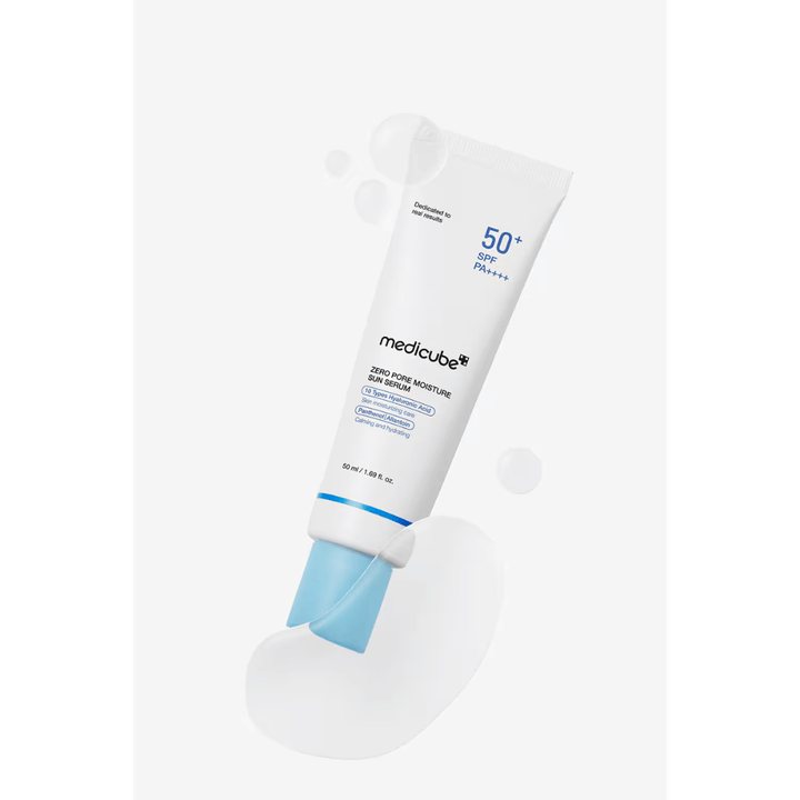 Medicube Zero Pore Moisture Sun Serum SPF50+ PA++++ with a light serum texture. The image highlights the moisturizing formula that helps the skin feel soft, soothed, and protected from the sun.