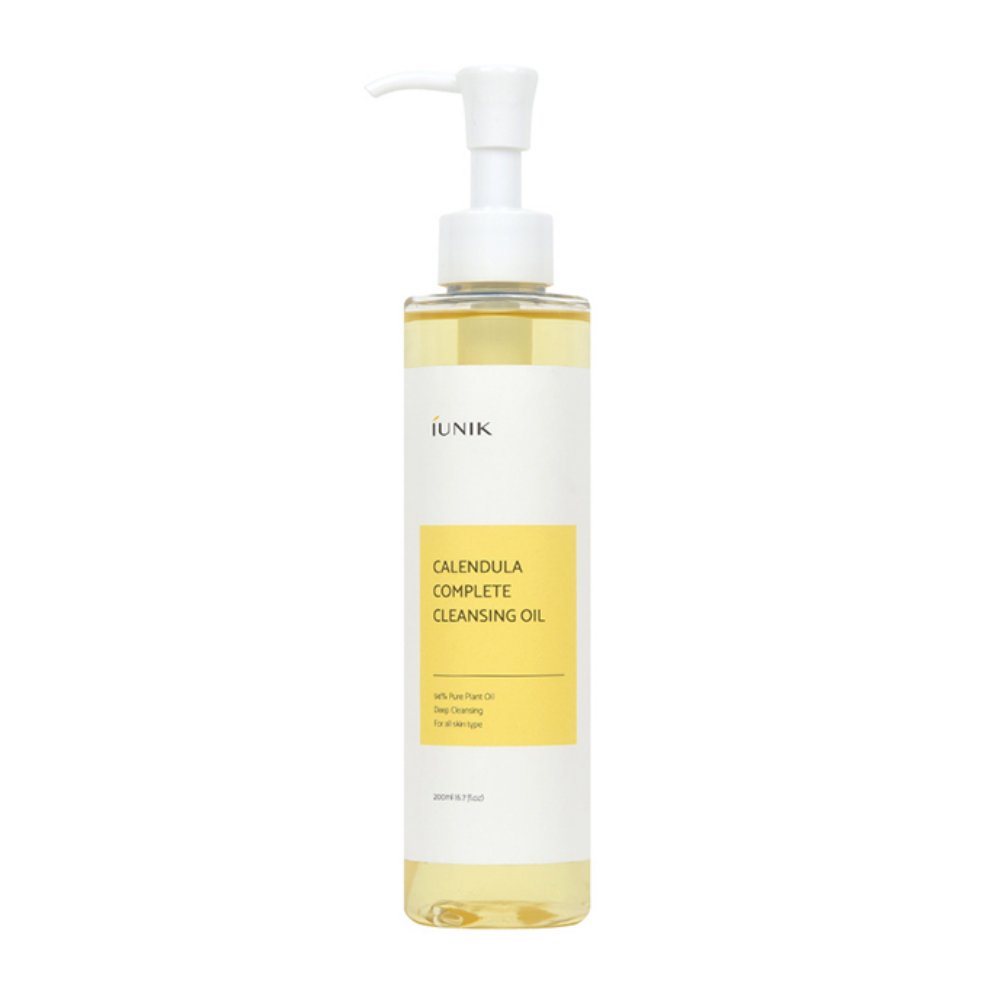 A bottle iUNIK Calendula Complete Cleansing Oil 200ml to remove makeup residues with a yellow label on a white background.